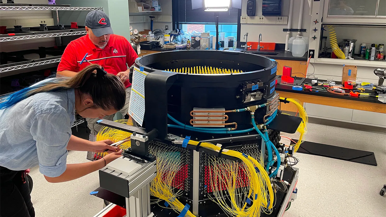 Students and staff working on the integration of the FPS instrument